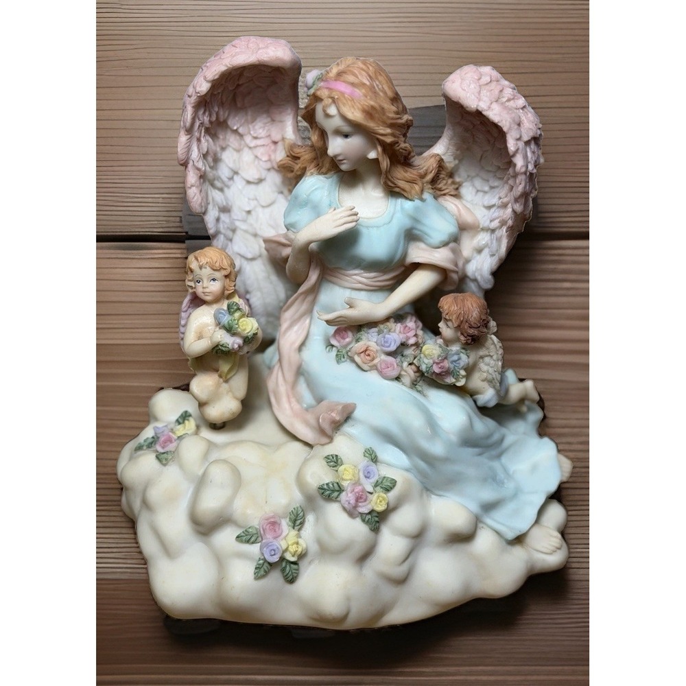 Classic Treasure USA Angel with Cherubs Music Box Figurine Plays "Jesus Loves Me